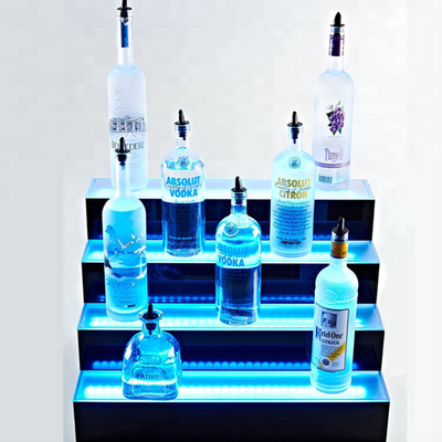 Gli scaffali principali acrilici di Antivari hanno condotto il vassoio del banco di mostra dello scaffale del liquore per stoccaggio